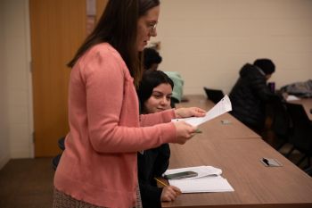 student and instructor reviewing work