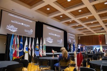 college logo on screen in SCSU ballroom