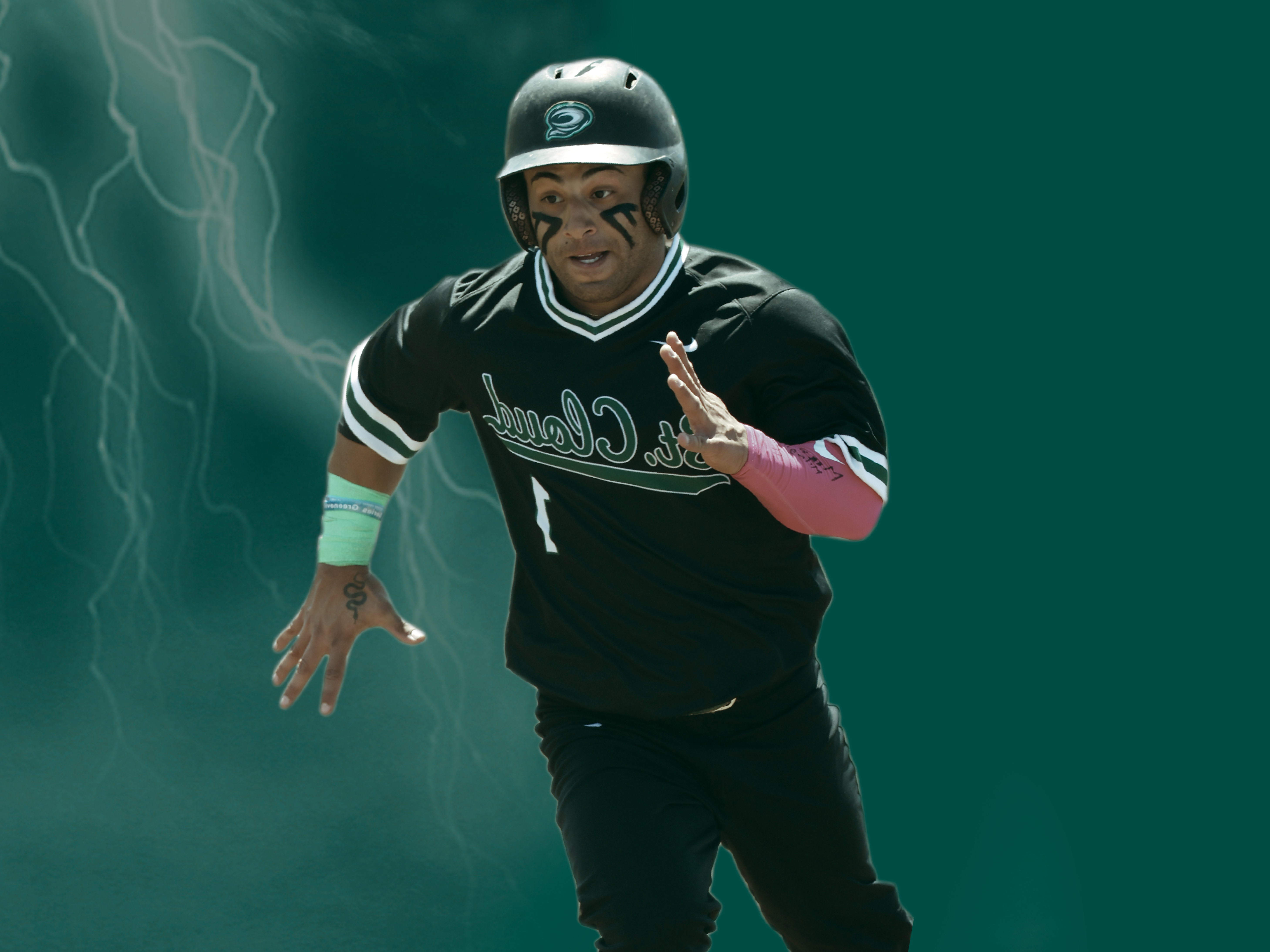 Baseball player running with green background