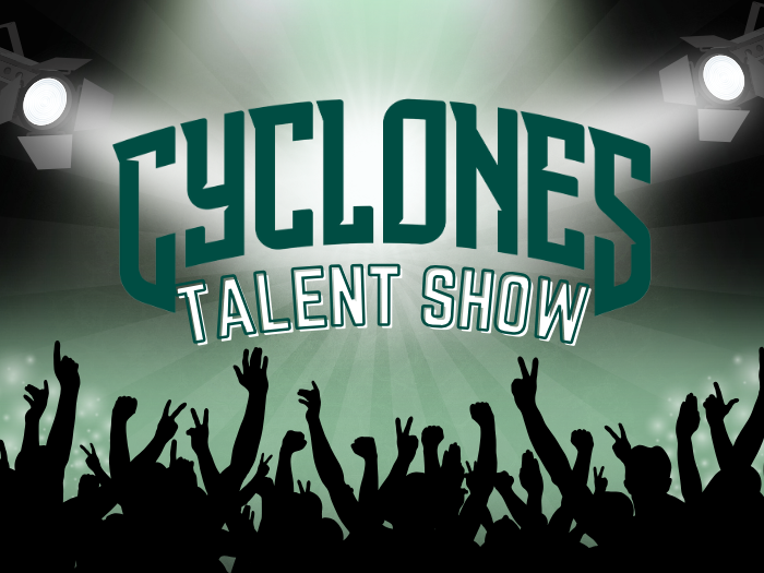 Cyclones Talent show - silhouette of cheering crowd and spotlights