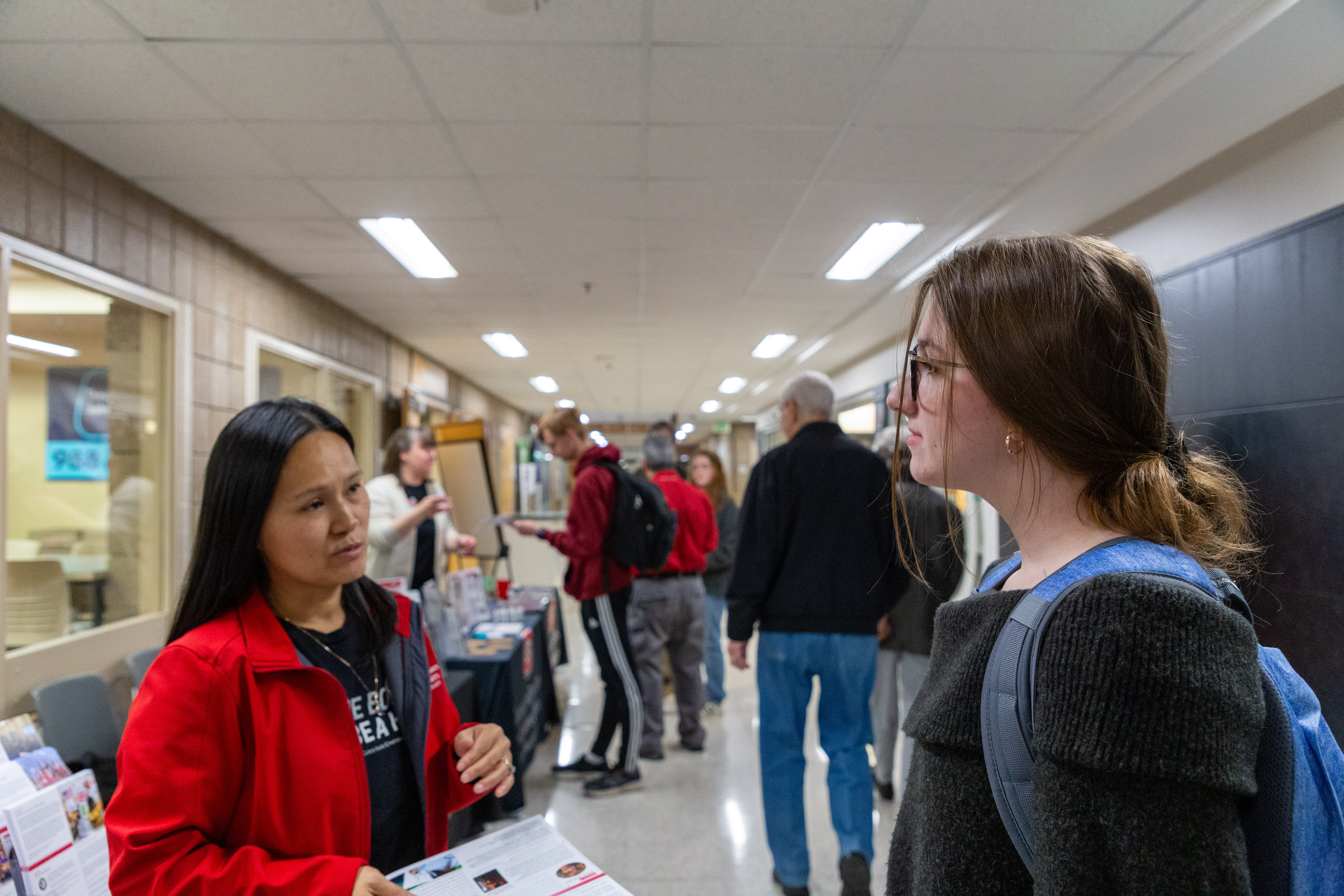 student talking with rep