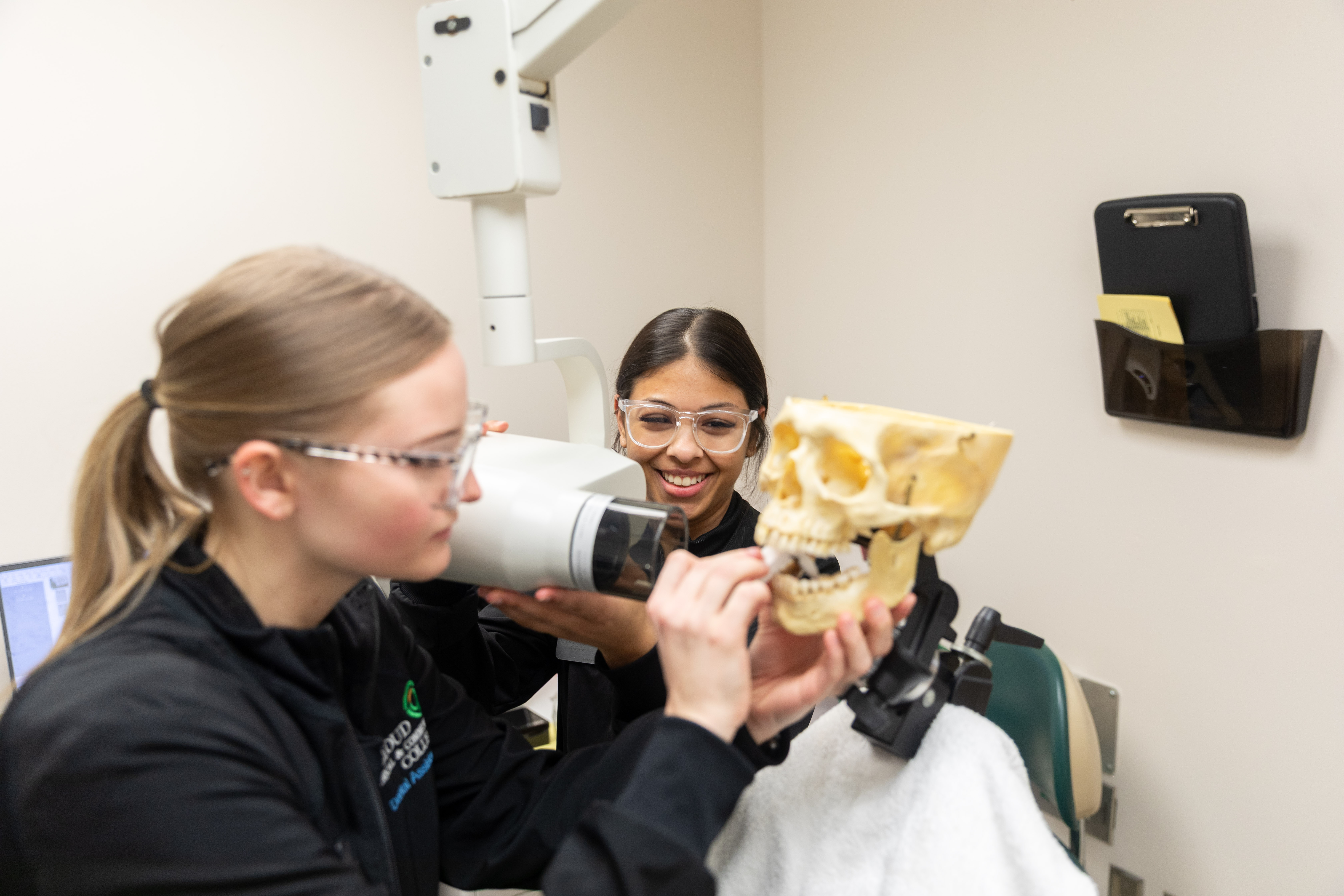 dental assistants setting up practice x-ray