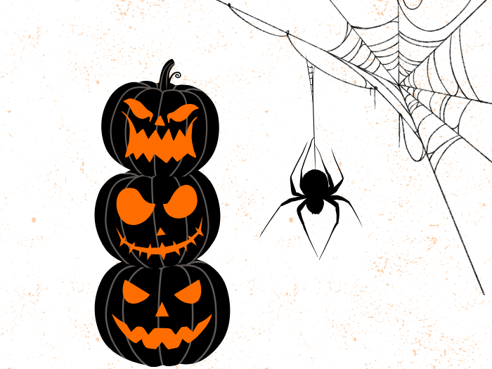 spider and spider web with a stack of 3 jack o lanterns