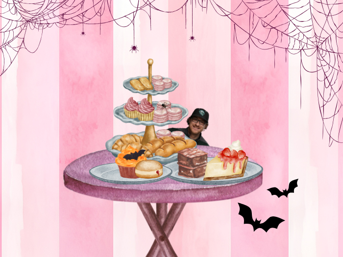 table of desserts with spiderwebs on pink striped background