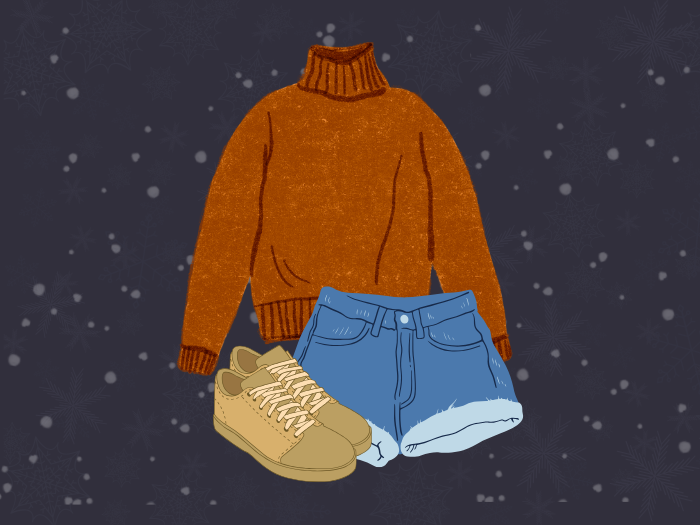 retro orange sweater, distressed blue jean shorts, and a pair of tan sneakers