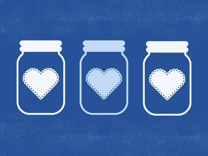 three jars with lace hearts on them 