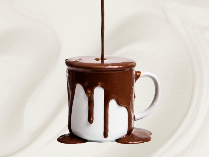 melted chocolate being poured into cup